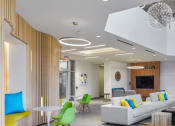 Thumbnail 7 of 34 - Lounge Seating, Work Stations & Relaxing Fireplace at The Oxford Apartments, Oxon Hill