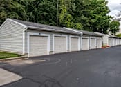 Thumbnail 16 of 18 - Row of private single car garages at Park at Winterset Apartments, Owings Mills, 21117