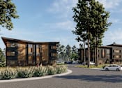 Thumbnail 2 of 9 - A modern building with a curved wooden facade is surrounded by trees and a car is parked in front.