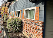Thumbnail 8 of 47 - A grey building with the numbers 10961 and 10963 on it.