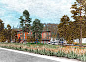 Thumbnail 5 of 9 - A road with a building and trees on the side.