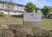 Thumbnail 47 of 47 - A building with a sign that says Grey Parc in front of it.