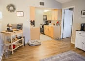 Thumbnail 15 of 24 - a view of a kitchen and living room from the dining room