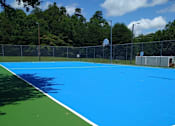 Thumbnail 19 of 29 - A blue and green tennis court with a timestamp in the corner at Sedgefield Square Apartments, North Carolina