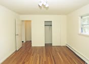 Thumbnail 14 of 16 - a bedroom with hardwood floors and white walls1 at Willow Gardens Apartments, New Jersey