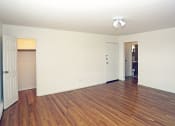 Thumbnail 13 of 16 - a bedroom with hardwood floors and white walls at Willow Gardens Apartments, Teaneck, New Jersey
