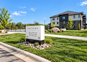 Thumbnail 65 of 71 - A sign for Vue Pointe in front of a building.