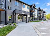 Thumbnail 12 of 71 - The image shows a modern building with the number 3009 on it.