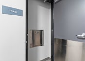 Thumbnail 9 of 22 - a door with a sign that reads trash on the side of it