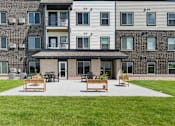 Thumbnail 22 of 22 - our apartments have a large patio with chairs and tables