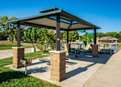 Thumbnail 4 of 36 - Balsam Apartments Outdoor Lounge Area