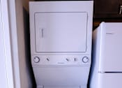 Thumbnail 5 of 9 - A white stacked washer and dryer.