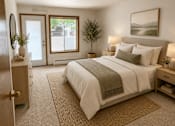 Thumbnail 17 of 20 - A bedroom with a large bed and a small tree.