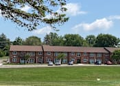 Thumbnail 2 of 15 - E building where office is located