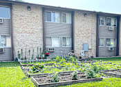 Thumbnail 20 of 20 - a garden in front of a building