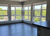 Thumbnail 17 of 29 - an empty room with a large window