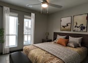 Thumbnail 6 of 29 - Large bedroom with lots of natural light