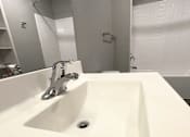 Thumbnail 22 of 29 - a bathroom with a sink and a bathtub