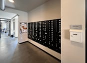 Thumbnail 3 of 20 - a large filing cabinet on a wall in a hallway of a office