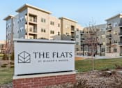 Thumbnail 3 of 80 - The Flats at Bishop's Woods is a residential complex.