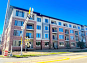 Thumbnail 1 of 50 - The Madisonian, Senior Housing in Madison WI. Affordable one bedroom apartments, two bedroom apartments and three bedroom townhomes. New building. No smoking. Managed by Wisconsin Management Company, 1829 Aberg Ave