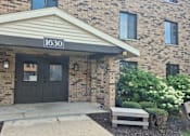 Thumbnail 2 of 25 - The front of a building with the number 1630 on it.