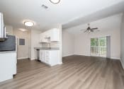Thumbnail 13 of 16 - a kitchen and living room in a 555 waverly unit