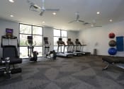 Thumbnail 22 of 27 - Fitness Center cardio area at The Gallery Midtown Apartments in Richmond, VA