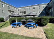 Thumbnail 24 of 27 - Outdoor Patio with Grills at The Gallery Midtown Apartments in Richmond, VA