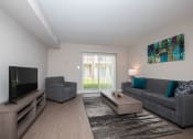 Thumbnail 8 of 16 - Spacious living room with plush carpet