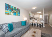 Thumbnail 6 of 16 - Spacious living room with granite bar countertop