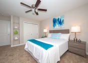 Thumbnail 10 of 16 - Large bedroom with ceiling fan that is big enough for a king size bed