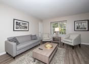 Thumbnail 3 of 15 - Living Room in Country Club Apartments in Williamsburg VA 