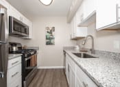 Thumbnail 1 of 15 - Kitchen in Country Club Apartments in Williamsburg VA 
