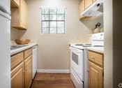Thumbnail 17 of 22 - model kitchen at Summit Ridge Apartments, Temple, TX, 76502