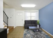 Thumbnail 3 of 11 - Large living room with lots of natural light  at Kingston Townhomes, Baltimore, MD