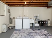 Thumbnail 19 of 36 - Full size washer and washer in basement