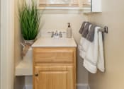 Thumbnail 17 of 32 - Small bathroom with a sink at Seven Oaks Townhomes, Edgewood, Maryland