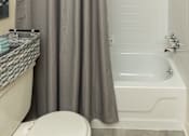Thumbnail 12 of 27 - Bathroom With Bathtub at Deer Park Apartments, Randallstown, MD 21133