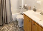 Thumbnail 9 of 23 - Bathroom with tub at Rockdale Gardens Apartments*, Baltimore, MD