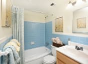 Thumbnail 19 of 19 - Hallway bathroom with soaking tub at Winston Apartments, Maryland