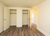 Thumbnail 20 of 23 - Bedroom with two closets and hardwood floors at The Orchards at Severn Townhomes*, Maryland, 21144
