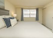 Thumbnail 7 of 20 - White Bedroom at Colony Hill Apartments & Townhomes, Baltimore, MD, 21227