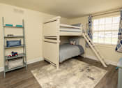 Thumbnail 24 of 36 - A bedroom with a bunk bed and a ladder.at Chapel Valley Townhomes, Nottingham