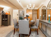 Thumbnail 11 of 31 - Spacious dining room with storage at Spring Hill Apartments & Townhomes, Baltimore Maryland