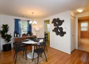 Thumbnail 7 of 10 - Dining room with hardwood flooring at Colony Hill Apartments & Townhomes, Baltimore, 21227