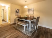 Thumbnail 6 of 29 - Dining room with six person table with chairs and bench in Randallstown, MD 21133.