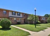 Thumbnail 1 of 21 - Chapel Valley Townhomes Front Exterior at Chapel Valley Townhomes, Baltimore Maryland