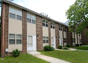 Thumbnail 24 of 25 - Main Entrance To Property at McDonogh Village Apartments & Townhomes, Randallstown, MD, 21133