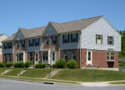 Thumbnail 36 of 36 - Walnut Grove Townhomes end unit front exterior at Walnut Grove Townhomes* Apartments, Essex, MD